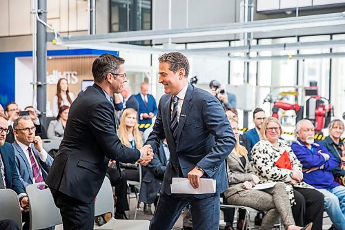 MIKAELA MACKENZIE / WINNIPEG FREE PRESS

President and CEO of Bell Canada Mirko Bibic (right) shakes hands with mayor Brian Bowman after announcing a large fibre optic investment in Manitoba at Red River College in Winnipeg on Monday, March 2, 2020. For Martin Cash story.
Winnipeg Free Press 2019.