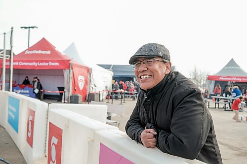 Mike Sudoma / Winnipeg Free Press
Jason Chamakese watches as kids play ball hockey in a arena brought in by Scotia Bank for the Hometown Hockey event at Peguis First Nation Saturday afternoon
February 29, 2020