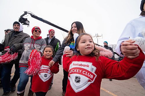 Mike Sudoma / Winnipeg Free Press
Community members young and old grab hands as they take part in a round dance lead by Loud Eagle Drum Group during Saturday afternoons Hometown Hockey Event in Peguis First Nation
February 29, 2020