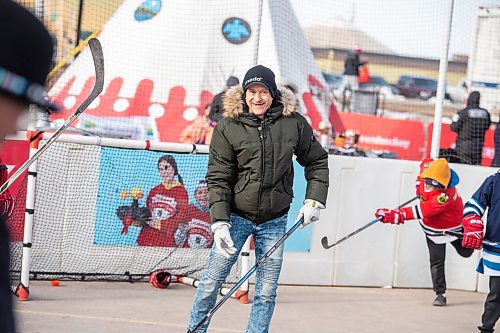 Mike Sudoma / Winnipeg Free Press
Clarence Irons plays ball hockey with kids from Peguis first nation during Saturdays Hometown Hockey event 
February 29, 2020