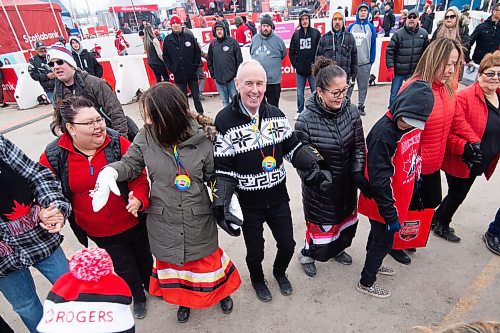 Mike Sudoma / Winnipeg Free Press
Sports Broadcasters, Ron Maclean and Tara Slone take part in a community round dance in Peguis First Nation Saturday afternoon
February 29, 2020