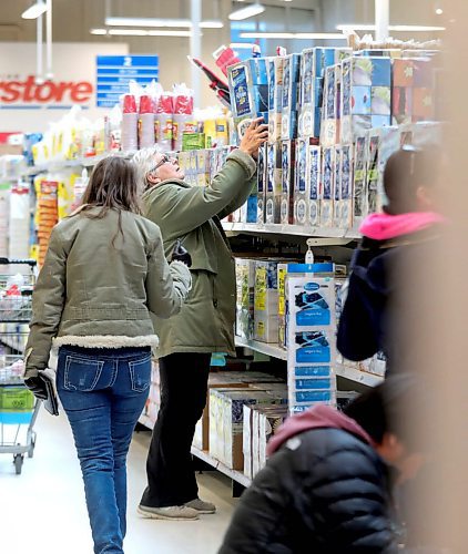 RUTH BONNEVILLE  /  WINNIPEG FREE PRESS 

Local -  Streeter, Shopping amid Coronavirus 

Many shoppers at Winnipeg big box stores not overly concerned about shortages due to the Coronavirus (COVID-19) but many are stockpiling rolls of toilet paper just in case.  

Photo of people shopping in paper products aisle at Superstore on Bison Drive for streeter story on asking shoppers if they are concerned or worried about  shortages due to the Coronavirus.
 
March 3rd,  2020
