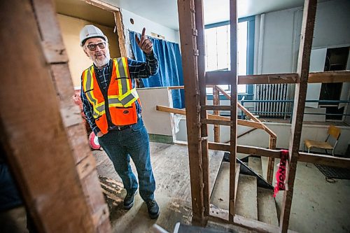 MIKAELA MACKENZIE / WINNIPEG FREE PRESS

Giovanni Geremia, principal of GW Architecture Inc, points out old, narrow staircases at the Ukrainian Labour Temple, which is undergoing renovations to make it accessible, in Winnipeg on Wednesday, March 4, 2020. For Sol Israel story.
Winnipeg Free Press 2019.