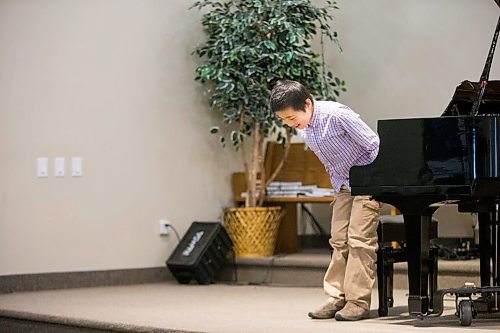 MIKAELA MACKENZIE / WINNIPEG FREE PRESS

Kadn Eidse bows after playing sonatina in G major (op.55, no.2, 3rd mnmt.) by Friedrich Kuhlau on the piano as part of the Winnipeg Music Festival at the Sterling Mennonite Fellowship in Winnipeg on Wednesday, March 4, 2020. 
Winnipeg Free Press 2019.