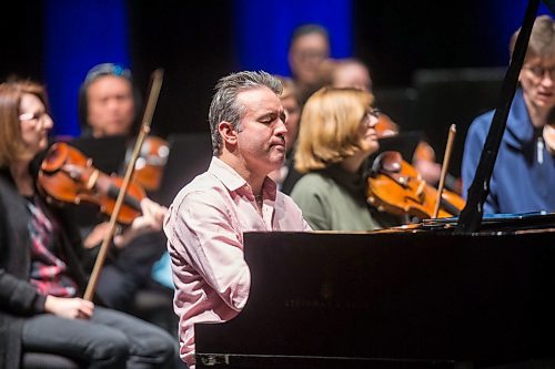 MIKAELA MACKENZIE / WINNIPEG FREE PRESS

Alexei Volodin, pianist, plays with the Winnipeg Symphony Orchestra as they rehearse for Back-to-Back Beethoven at the Centennial Concert Hall in Winnipeg on Thursday, March 5, 2020. 
Winnipeg Free Press 2019.