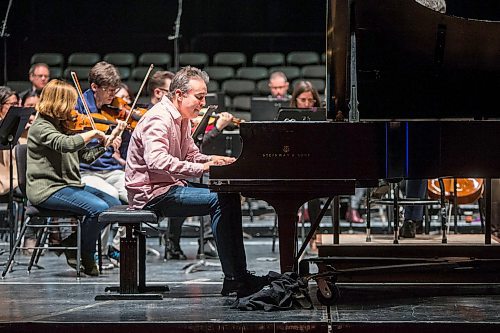 MIKAELA MACKENZIE / WINNIPEG FREE PRESS

Alexei Volodin, pianist, plays with the Winnipeg Symphony Orchestra as they rehearse for Back-to-Back Beethoven at the Centennial Concert Hall in Winnipeg on Thursday, March 5, 2020. 
Winnipeg Free Press 2019.