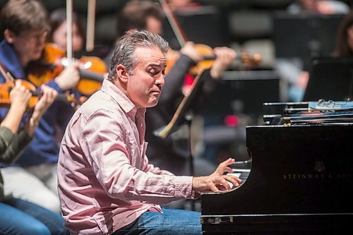 MIKAELA MACKENZIE / WINNIPEG FREE PRESS

Alexei Volodin, pianist, plays with the Winnipeg Symphony Orchestra as they rehearse for Back-to-Back Beethoven at the Centennial Concert Hall in Winnipeg on Thursday, March 5, 2020. 
Winnipeg Free Press 2019.