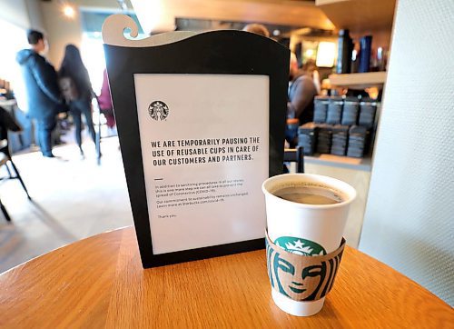 RUTH BONNEVILLE  /  WINNIPEG FREE PRESS 

Local - Starbucks cups

Photo of sign posted in Starbucks store on St. James Street.  This is a North American wide ban that started at this store today. (Thursday)

"We are temporarily pausing the use of reusable cups in care of our customers and partners. 
------
In addition to sanitizing procedures in all our stores, this is one more step we can all take to prevent the spread of Coronavirus (COVID -19).
Our commitment to sustainability remains unchanged. Learn more at Starbucks.com/covid-19."

Note: This includes the use of Starbucks serving you a Starbucks china cup that is from inside their coffee shop to drink from while sitting inside their store.  

March 5th,  2020
