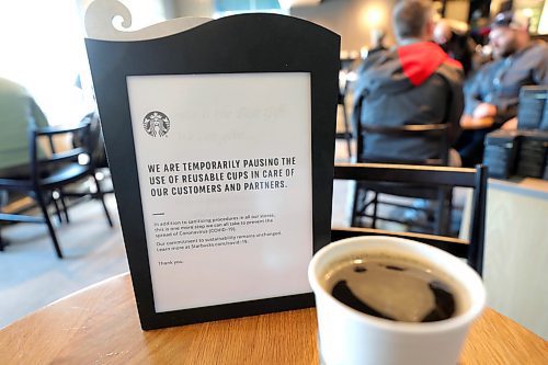 RUTH BONNEVILLE  /  WINNIPEG FREE PRESS 

Local - Starbucks cups

Photo of sign posted in Starbucks store on St. James Street.  This is a North American wide ban that started at this store today. (Thursday)

"We are temporarily pausing the use of reusable cups in care of our customers and partners. 
------
In addition to sanitizing procedures in all our stores, this is one more step we can all take to prevent the spread of Coronavirus (COVID -19).
Our commitment to sustainability remains unchanged. Learn more at Starbucks.com/covid-19."

Note: This includes the use of Starbucks serving you a Starbucks china cup that is from inside their coffee shop to drink from while sitting inside their store.  

March 5th,  2020
