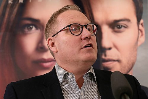 SHANNON VANRAES / WINNIPEG FREE PRESS
Manitoba Finance Minister, Scott Fielding, stands in front of a poster for the TV show Burden of Proof while announcing a new film incentive at Manitoba Film and Music in downtown Winnipeg on March 6, 2020