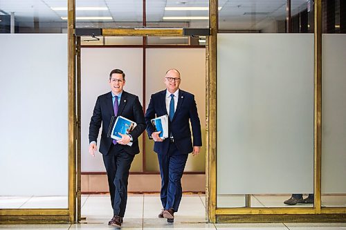 MIKAELA MACKENZIE / WINNIPEG FREE PRESS

Mayor Brian Bowman (left) and councillor Scott Gillingham walk in before speaking to media about the 2020 budget at City Hall in Winnipeg on Friday, March 6, 2020. 
Winnipeg Free Press 2019.