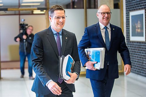 MIKAELA MACKENZIE / WINNIPEG FREE PRESS

Mayor Brian Bowman (left) and councillor Scott Gillingham walk in before speaking to media about the 2020 budget at City Hall in Winnipeg on Friday, March 6, 2020. 
Winnipeg Free Press 2019.