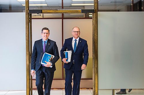 MIKAELA MACKENZIE / WINNIPEG FREE PRESS

Mayor Brian Bowman (left) and councillor Scott Gillingham walk in before speaking to media about the 2020 budget at City Hall in Winnipeg on Friday, March 6, 2020. 
Winnipeg Free Press 2019.