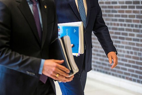 MIKAELA MACKENZIE / WINNIPEG FREE PRESS

Mayor Brian Bowman (left) and councillor Scott Gillingham walk in before speaking to media about the 2020 budget at City Hall in Winnipeg on Friday, March 6, 2020. 
Winnipeg Free Press 2019.