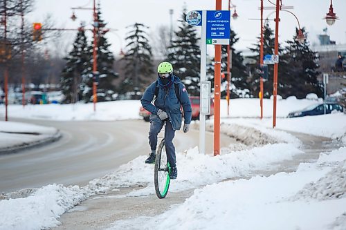 MIKE DEAL / WINNIPEG FREE PRESS
Daniel Voth has his winter tire on. Tire. Singular. Hes become known for riding his unicycle to work, and not even an icy winter road, nor over-aggressive Winnipeg traffic, can stop him.
200306 - Friday, March 06, 2020.