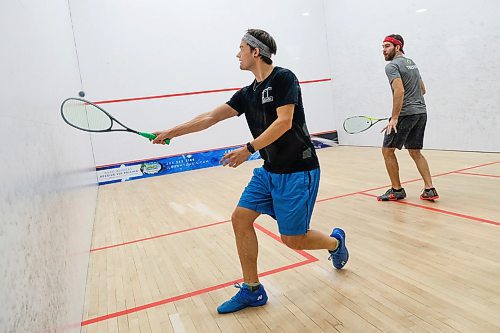 Daniel Crump / Winnipeg Free Press.¤Connor Turk (black) vs Andrew Thiessen (grey) at the Winnipeg Squash Racquet Club. March 6, 2020.