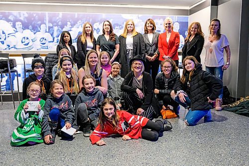 Daniel Crump / Winnipeg Free Press.¤Women and girls pose for a group photos after taking part in a panel discussion as part gender equality night hosted by the Manitoba Moose. March 7, 2020.