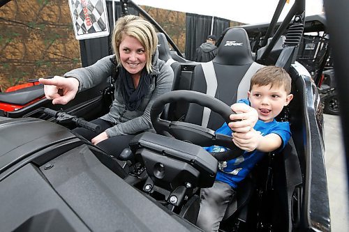JOHN WOODS / WINNIPEG FREE PRESS
Meagan Plett and her son Jack try out an ATV at the Mid-Canada Boat Show at Winnipegs convention centre Sunday, March 8, 2020. 

Reporter: Standup