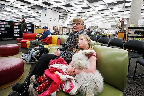 JOHN WOODS / WINNIPEG FREE PRESS
Elaine McAra and her niece Genevieve, 6 talk about possible library closures before a puppet show at Winnipegs Millennium Library Sunday, March 8, 2020. Winnipegs recent budget proposes library and program cuts.

Reporter: Rutgers