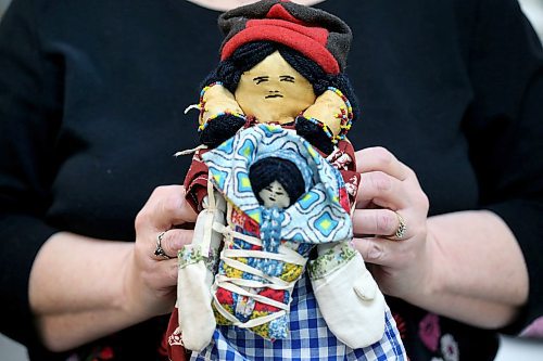 SHANNON VANRAES / WINNIPEG FREE PRESS
Lorraine Iverach holds a vintage tea doll at a warehouse in Winnipeg's West End on March 6, 2020. Tea dolls are stuffed with tea and were made by the Innu of Labrador and Eastern Quebec.