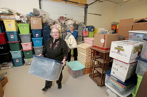 SHANNON VANRAES / WINNIPEG FREE PRESS
Kimberly Scutchings and Hedy McClelland move boxes at a West End warehouse filled with collectables, like dolls and stuffed animals, on March 6, 2020.
