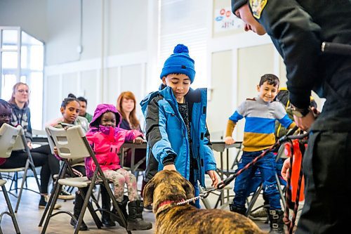 MIKAELA MACKENZIE / WINNIPEG FREE PRESS

Rami, six, pets Gemma in the NEEDS class introducing dogs and pet ownership to newcomers in Winnipeg on Monday, March 9, 2020. For Eva Wasney story.
Winnipeg Free Press 2019.