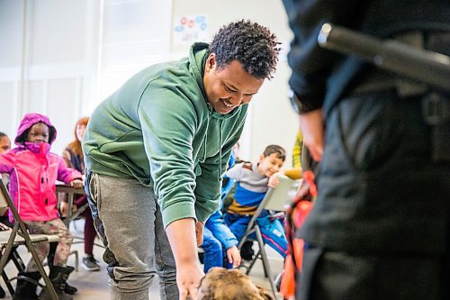 MIKAELA MACKENZIE / WINNIPEG FREE PRESS

Nasri, 15, pets Gemma in the NEEDS class introducing dogs and pet ownership to newcomers in Winnipeg on Monday, March 9, 2020. For Eva Wasney story.
Winnipeg Free Press 2019.