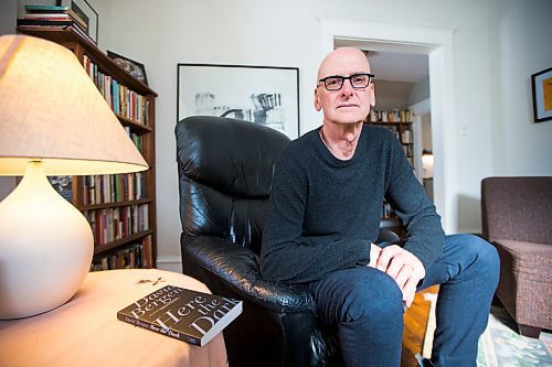 MIKAELA MACKENZIE / WINNIPEG FREE PRESS

Author David Bergen poses for a portrait with his new collection of stories, Here the Dark, in his home Winnipeg on Monday, March 9, 2020. For Ben Sigurdson story.
Winnipeg Free Press 2019.