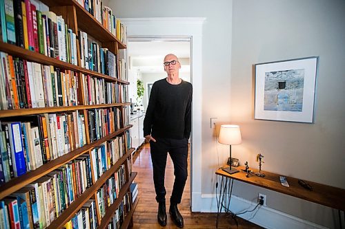 MIKAELA MACKENZIE / WINNIPEG FREE PRESS

Author David Bergen poses for a portrait with his new collection of stories, Here the Dark, in his home Winnipeg on Monday, March 9, 2020. For Ben Sigurdson story.
Winnipeg Free Press 2019.