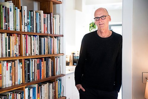 MIKAELA MACKENZIE / WINNIPEG FREE PRESS

Author David Bergen poses for a portrait with his new collection of stories, Here the Dark, in his home Winnipeg on Monday, March 9, 2020. For Ben Sigurdson story.
Winnipeg Free Press 2019.