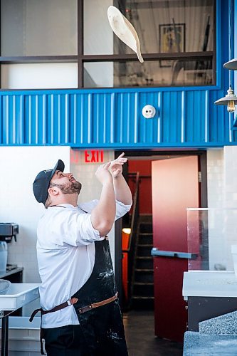 MIKAELA MACKENZIE / WINNIPEG FREE PRESS

Owner Thomas Schneider flips some dough at Tommy's Pizzeria in Winnipeg on Tuesday, March 10, 2020. 
Winnipeg Free Press 2019.