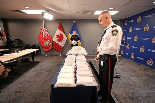 RUTH BONNEVILLE  /  WINNIPEG FREE PRESS 

Local - WPS Drug seizure

The Public Information Office hold a media briefing announcing a significant drug seizure and arrests involving an inter-provincial drug cell.  Inspector Max Waddell of the Organized Crime Division, speaks with the media about the exhibits on display in front of him of the large amount of cocaine and illegal cannabis recently seized from a cross-country, commercial, truck driver coming from BC to Wpg recently.

See Kevin Rollason's story. 

March 12th, 2020


