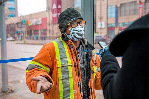 MIKAELA MACKENZIE / WINNIPEG FREE PRESS

Transit rider Jerson Salas speaks to the Free Press about his COVID-19 concerns on Portage Avenue in downtown Winnipeg on Thursday, March 12, 2020. For Julia-Simone Rutgers story.
Winnipeg Free Press 2019.