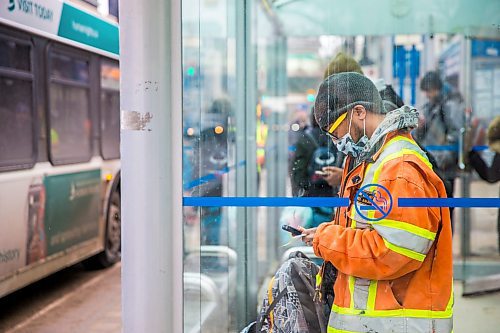 MIKAELA MACKENZIE / WINNIPEG FREE PRESS

Transit rider Jerson Salas waits for his bus on Portage Avenue in downtown Winnipeg on Thursday, March 12, 2020. For Julia-Simone Rutgers story.
Winnipeg Free Press 2019.