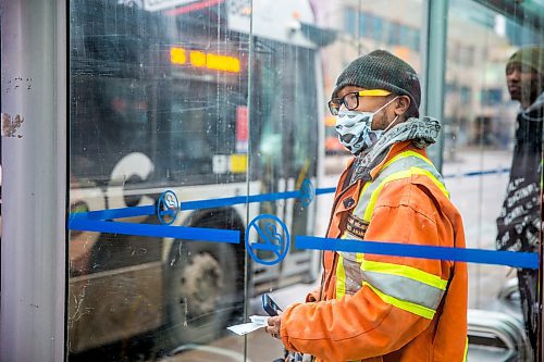 MIKAELA MACKENZIE / WINNIPEG FREE PRESS

Transit rider Jerson Salas waits for his bus on Portage Avenue in downtown Winnipeg on Thursday, March 12, 2020. For Julia-Simone Rutgers story.
Winnipeg Free Press 2019.