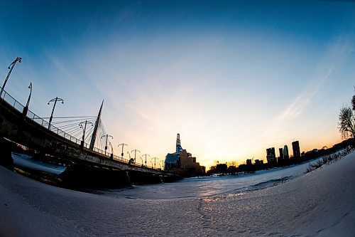 Mike Sudoma / Winnipeg Free Press
The Skyline of Downtown Winnipeg silhouetted by Friday evenings sunset as seen from Tachê Avenue in St Boniface
March 13, 2020