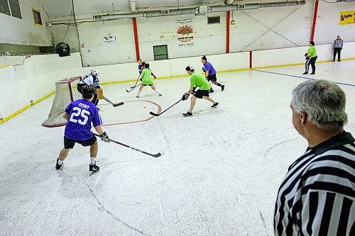 Daniel Crump / Winnipeg Free Press.¤Dreas Dragons (green) play the Illegal Curves (purple) at the Stick it to Cancer Ball Hockey Fundraiser in support of six-year-old Drea Pepe at Duncan Sportsplex. March 14, 2020.