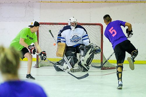 Daniel Crump / Winnipeg Free Press.¤Dreas Dragons (green) play the Illegal Curves (purple) at the Stick it to Cancer Ball Hockey Fundraiser in support of six-year-old Drea Pepe at Duncan Sportsplex. March 14, 2020.