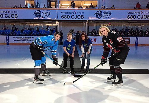 SUBMITTED PHOTO

Debbie Blair and her son Noah Blair (who has received a kidney transplant) participate in the ceremonial puck drop with Winnipeg Ice centre Peyton Krebs (left) and Moose Jaw Warriors centre Ryder Korczak as the Kidney Foundation of Canada, Manitoba Branch, promoted organ donation awareness on March 7, 2020 by paying tribute to Logan Boulet at the Winnipeg Ice game WHL game against the Moose Jaw Warriors at the Wayne Fleming Arena. (See Social Page)
