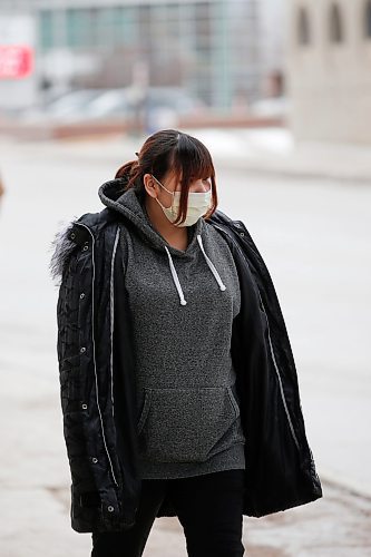 JOHN WOODS / WINNIPEG FREE PRESS
A person walks outside the emergency department at Health Sciences Centre in Winnipeg Sunday, March 15, 2020. The province announced the 7th COVID-19 case.

Reporter: Allen