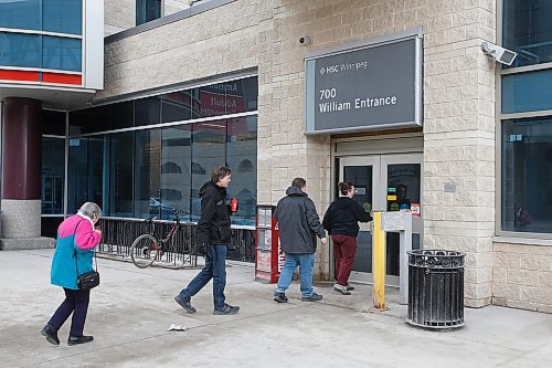 JOHN WOODS / WINNIPEG FREE PRESS
People line up to and wait for the door to be unlocked at Health Sciences Centre in Winnipeg Sunday, March 15, 2020. The province announced the 7th COVID-19 case.

Reporter: Allen