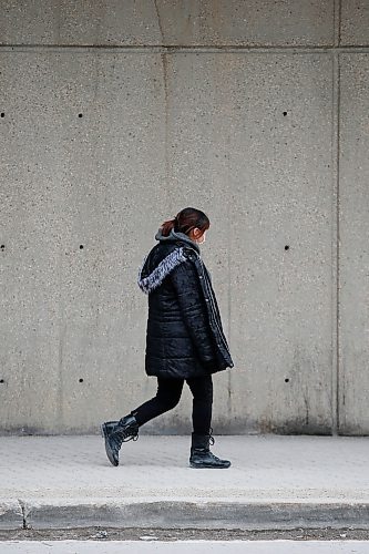 JOHN WOODS / WINNIPEG FREE PRESS
A person walks outside the emergency department at Health Sciences Centre in Winnipeg Sunday, March 15, 2020. The province announced the 7th COVID-19 case.

Reporter: Allen