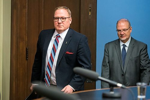 MIKAELA MACKENZIE / WINNIPEG FREE PRESS
Finance minister Scott Fielding (left) and government house leader Kelvin Goertzen walk in to speak to media about the delayed budget at the Manitoba Legislative Building in Winnipeg on Monday, March 16, 2020.
Winnipeg Free Press 2019.