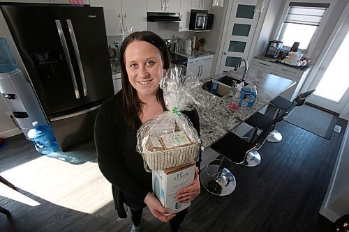 SHANNON VANRAES / WINNIPEG FREE PRESS
Kendra Turl is considering postponing her wedding social, as well as her wedding, amid widening efforts to curb the spread of COVID-19. She is pictured at her home in New Transcona on March 16, 2020.