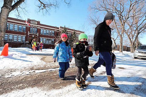 RUTH BONNEVILLE  /  WINNIPEG FREE PRESS 

Local -  Kids at School

A parent walks her kids home from Linwood School in St. James Monday after school.   Many parents have decided to keep their kids home from school even though grade schools are still open in Manitoba.  
No Names for this family but they did agree to a photo.  
See story.

March 16th, 2020
