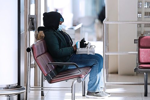 JOHN WOODS / WINNIPEG FREE PRESS
A person waits at the international airport in Winnipeg Monday, March 16, 2020. 

Reporter: ?