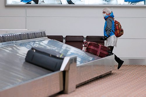 JOHN WOODS / WINNIPEG FREE PRESS
A person looks for luggage at the international airport in Winnipeg Monday, March 16, 2020. 

Reporter: ?