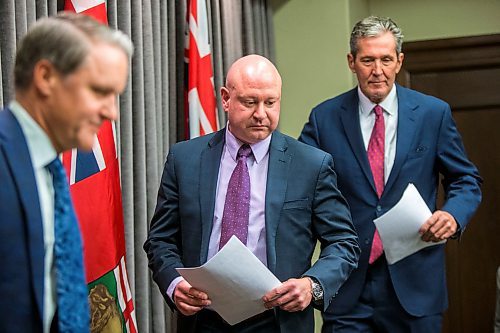 MIKAELA MACKENZIE / WINNIPEG FREE PRESS

Dr. Brent Roussin, chief provincial public health officer walks in to speak to the media about COVID-19 at the Manitoba Legislative Building in Winnipeg on Tuesday, March 17, 2020.
Winnipeg Free Press 2020