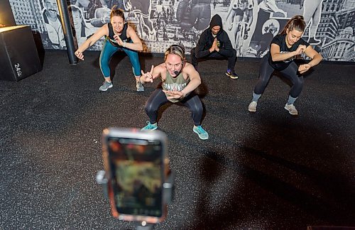 JESSE BOILY / WINNIPEG FREE PRESS
Kelly Sommerfield, left to right, Amie Seier, Alex Athayde, and Olivia Lee of Community Gym test their livestream workout in Winnipeg on Tuesday, March 17, 2020. They Hope to livestream one or two workouts a day as people practice social distancing. 
Reporter: Eva Wasney