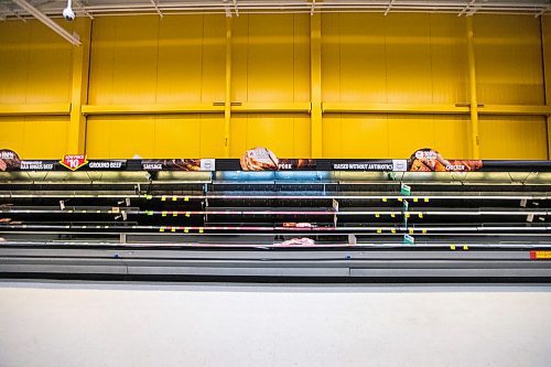 MIKAELA MACKENZIE / WINNIPEG FREE PRESS

Bare shelves in the meat department at the Grant Park Walmart in Winnipeg on Tuesday, March 17, 2020.
Winnipeg Free Press 2020